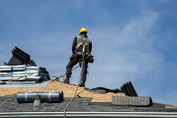 Professional Gutter Installation technician working in Holton, MI